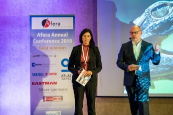 Ms. Ott with fellow Master of Ceremonies and Afera strategist Bert van Loon at Afera’s Athens Conference in 2018